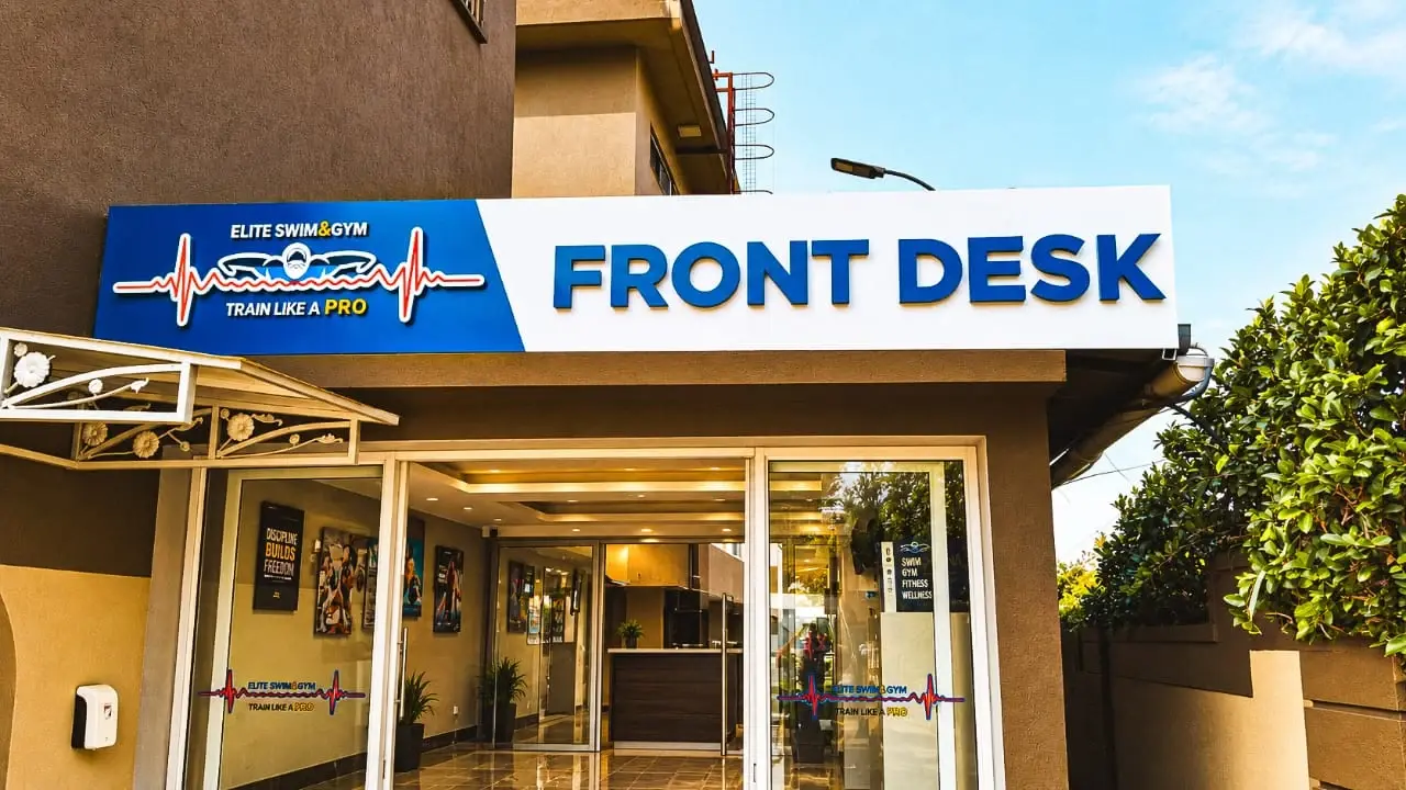 Elite Swim and Gym front desk sign